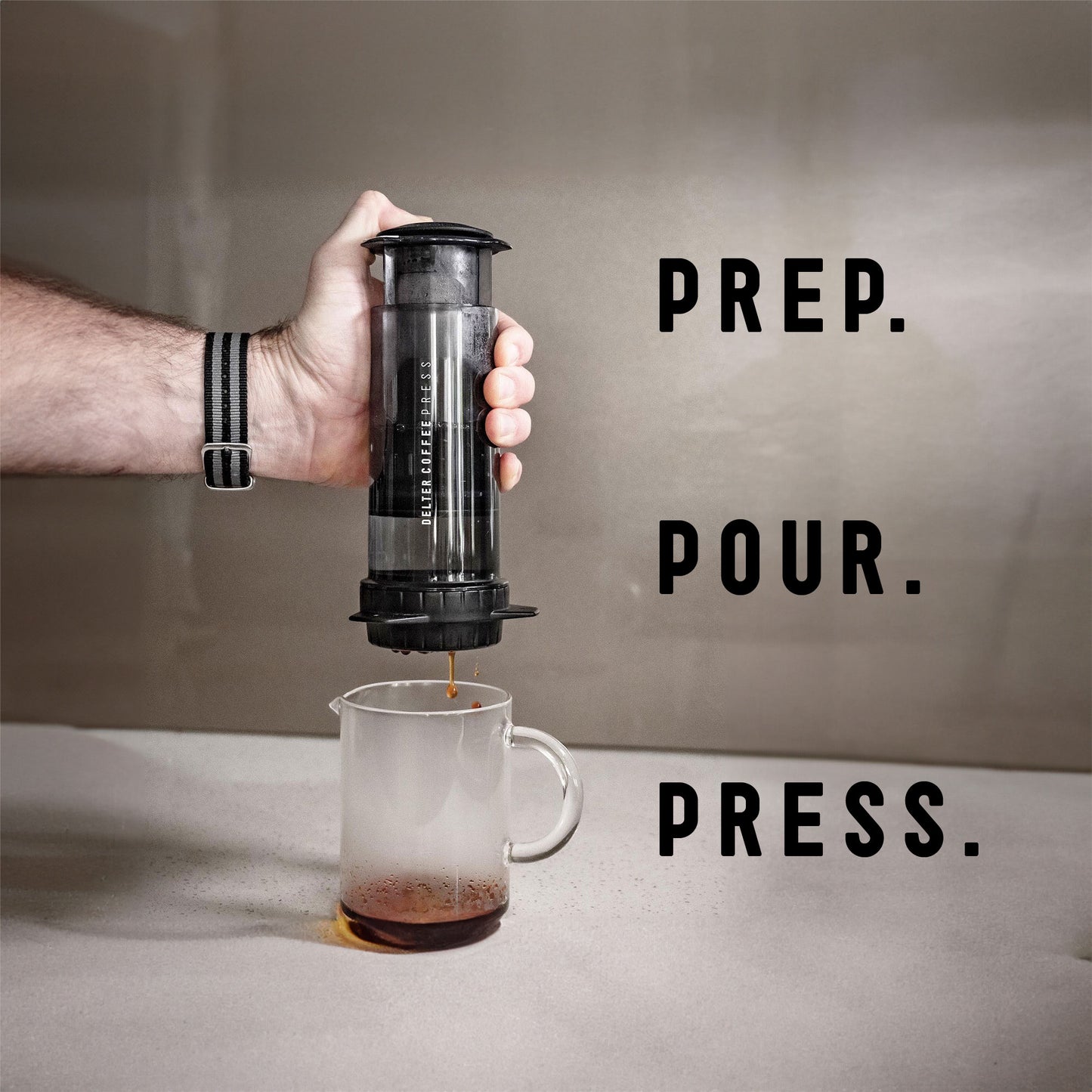 Woman pouring hot water into the Delter Coffee Press, making a perfect brew