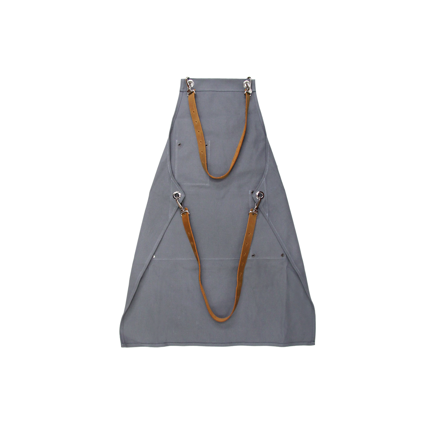 A barista wearing a Pesado Barista Apron while preparing espresso drinks at a coffee shop, showcasing the durability and functionality of the apron
###