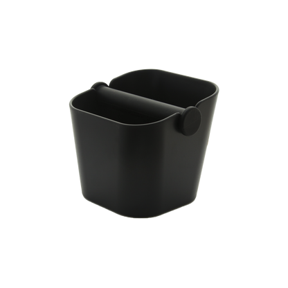 A black, stainless steel domestic knock bin with rubber bar