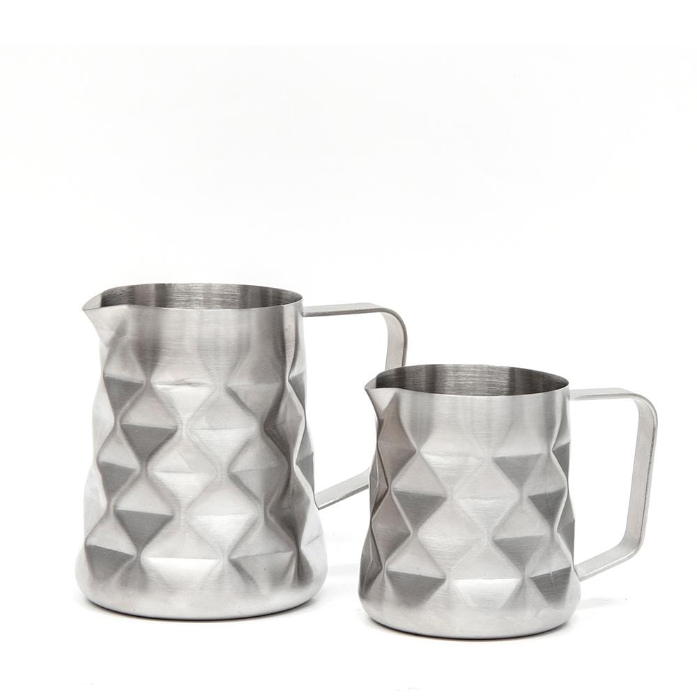 Minimalist black and white milk jug with geometric design and sleek lines