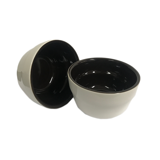 Alt text: Set of white ceramic cupping bowls with blue rims and spoons, perfect for enjoying small portions of sauces and condiments