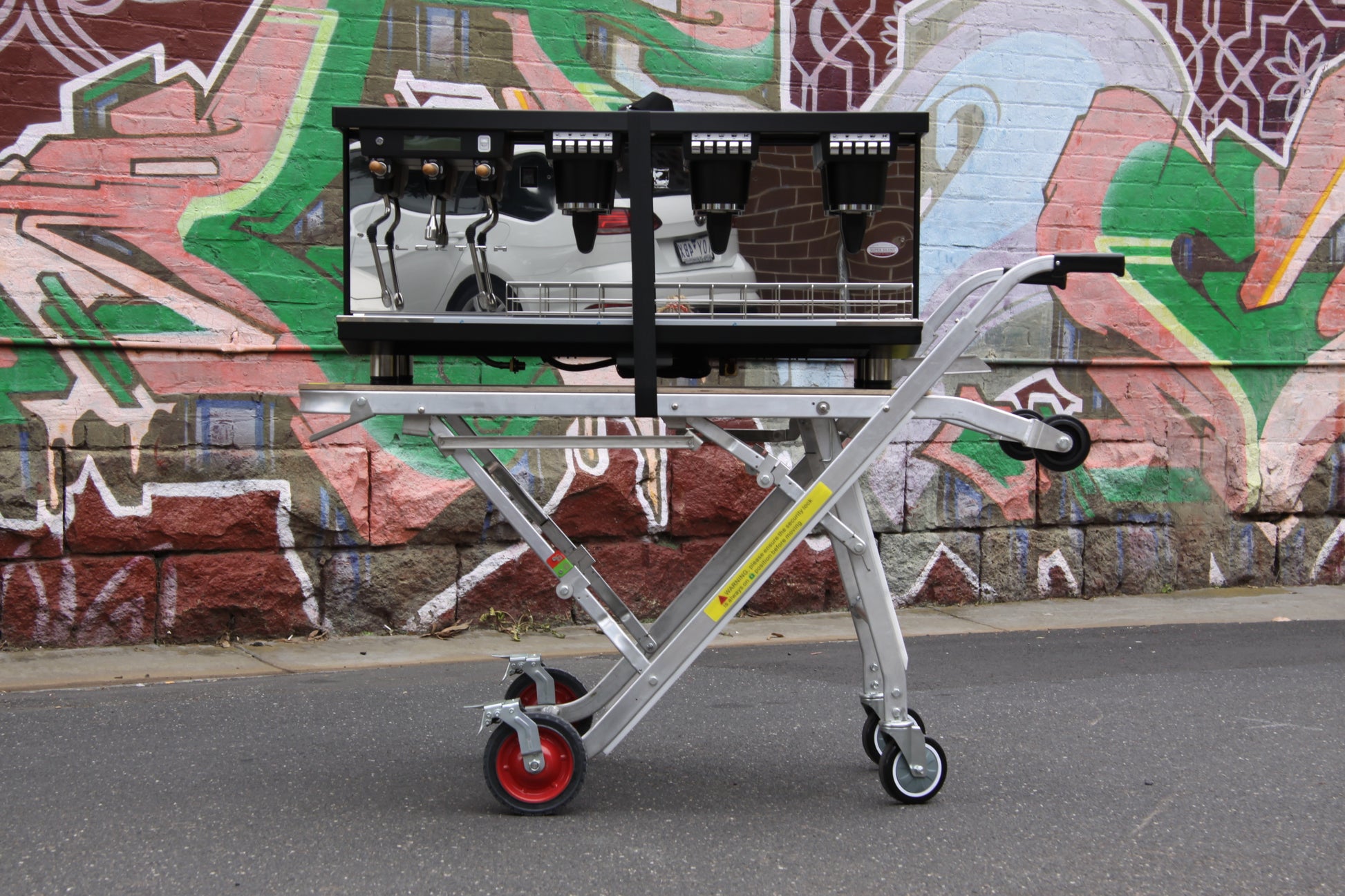 Stainless steel coffee machine trolley with wheels and multiple shelves for storage